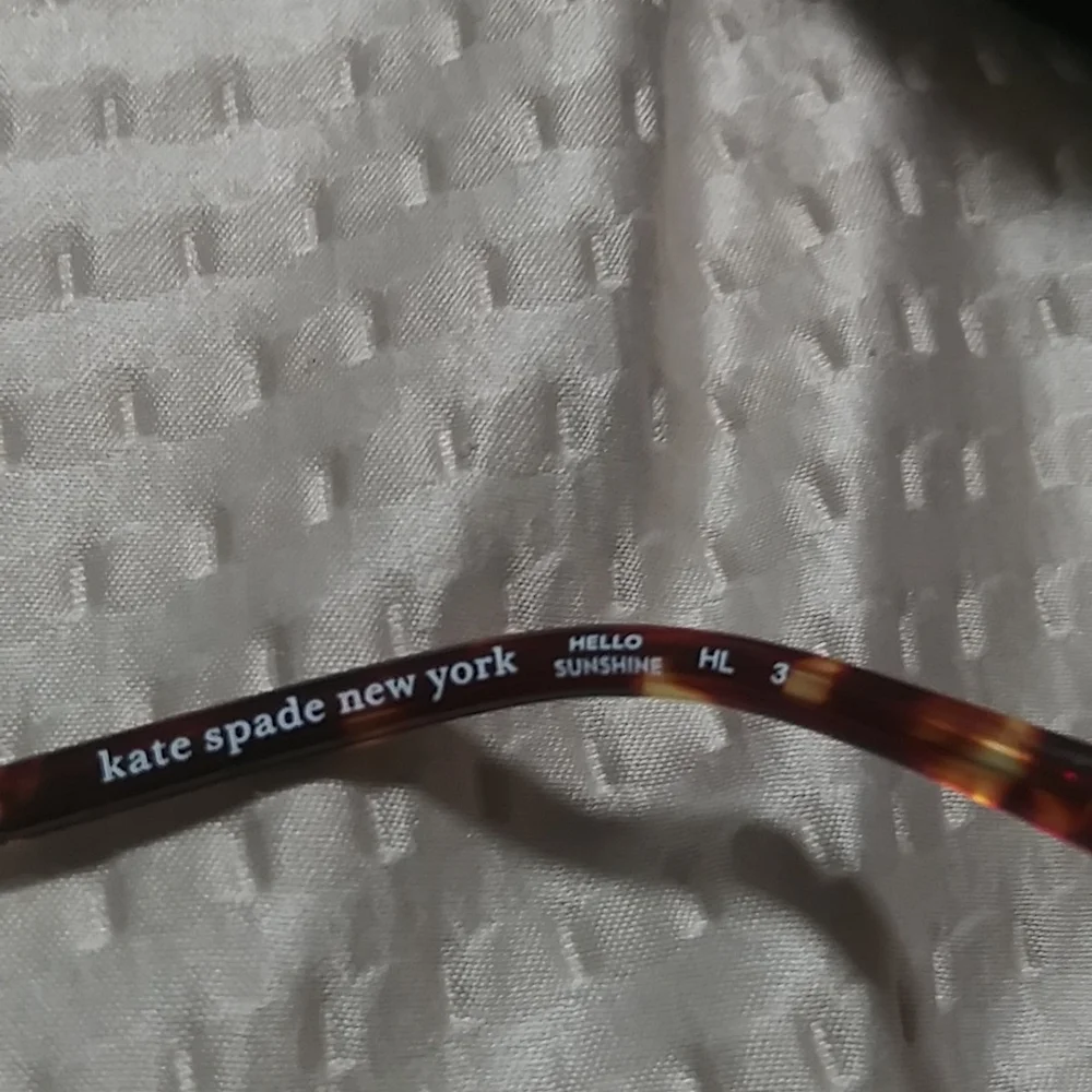 New Kate Spade New York sunglasses.